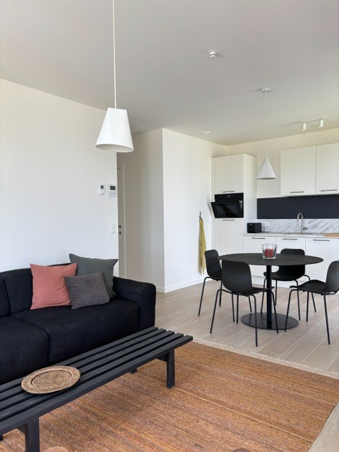 Nieuwbouwappartement met 2 slaapkamers, terras en fietsenberging.
