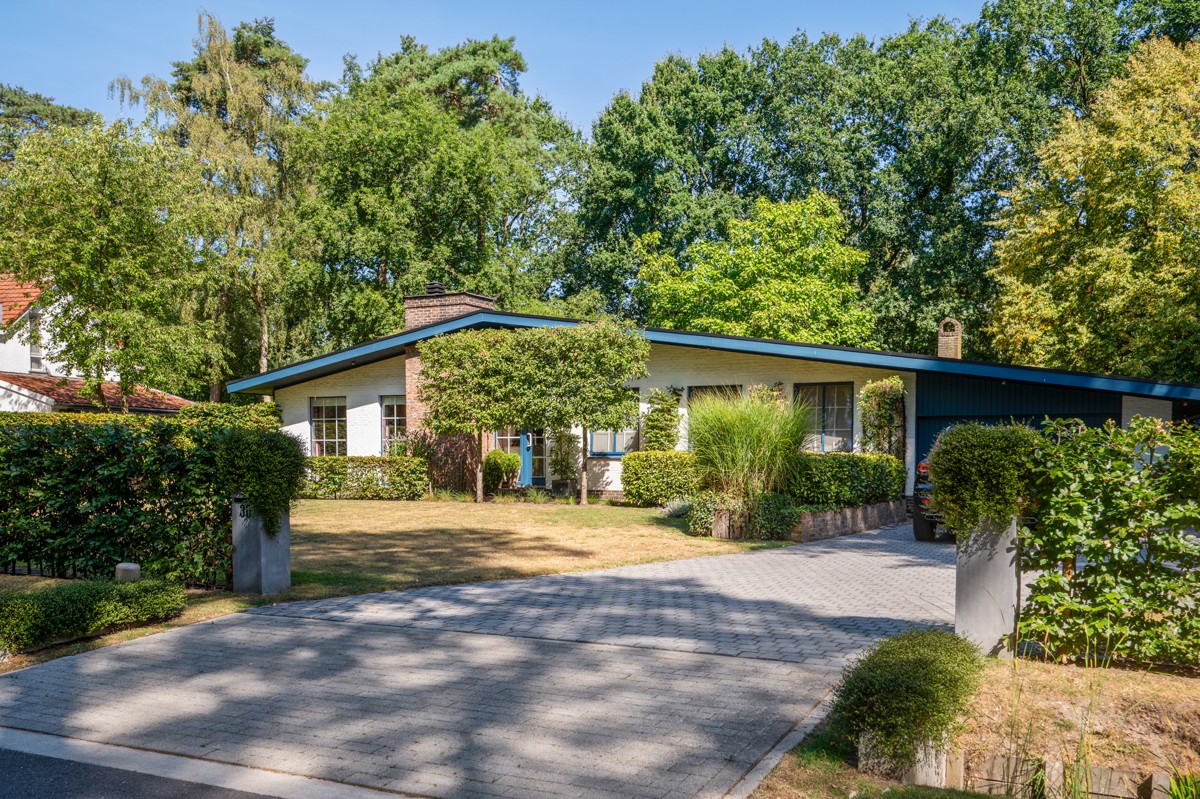Gelijkvloerse woning op 1423 m²- met vergund bijgebouw en zicht op groen!